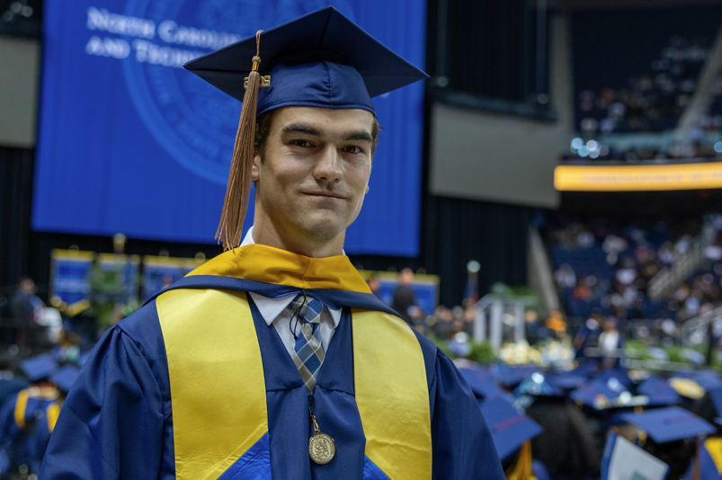 A new graduate at the Spring 2025 undergraduate commencement.
